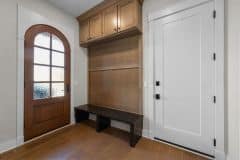 Arched Door Friends Entrance With Mudroom Bench