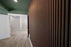 Lower Level Office With Acoustical Wood Panels