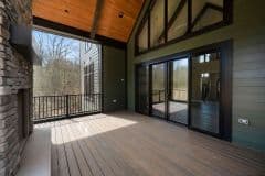 Screened Porch with Cathedral Ceiling and Stone Fireplace at Bear Creek