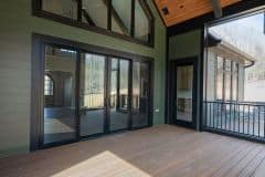Screened Porch with Cathedral Ceiling and Stone Fireplace at Bear Creek 
