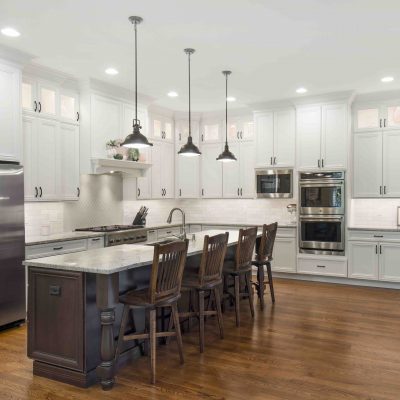 kitchen with island and white cabinets