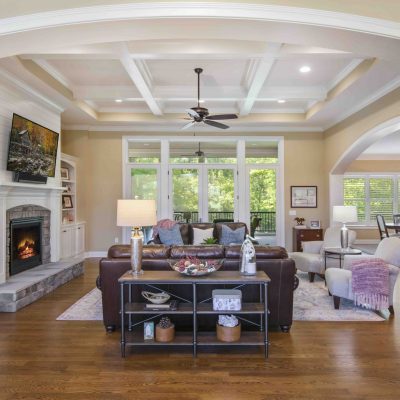 living room with coffered ceiling