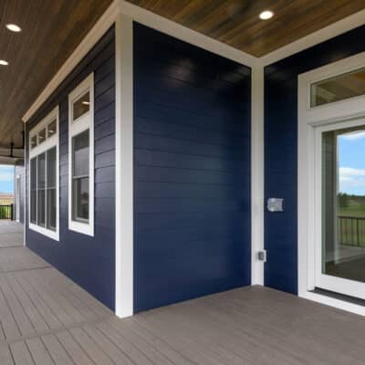 Two Story traditional custom home Dayton Ohio blue siding and white trim covered porch