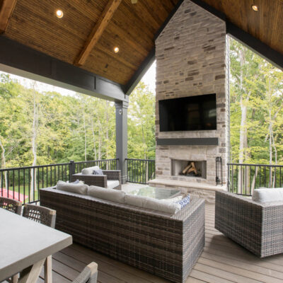 Woodford Custom Home Covered Porch With Fireplace
