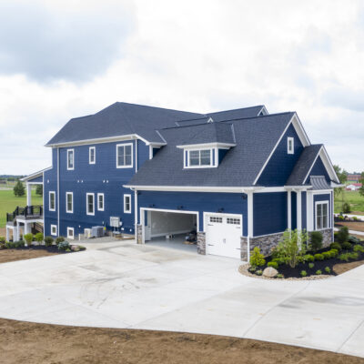 Two Story traditional custom home Dayton Ohio blue siding and white trim