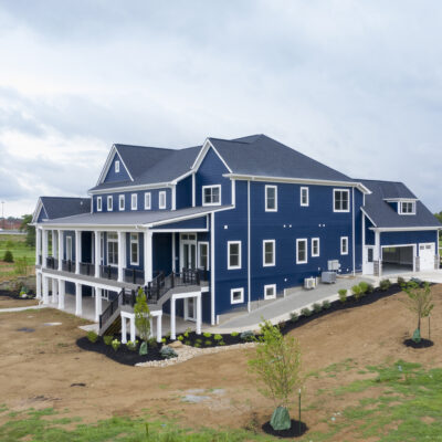 Two Story traditional custom home Dayton Ohio blue siding and white trim