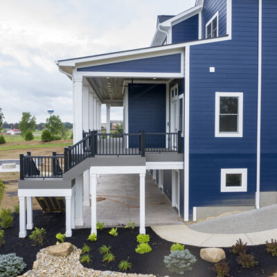 Tradition First Floor Master Home Two Story Blue Siding White Trim