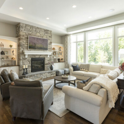 Great Room with Stone Fireplace and Built-ins