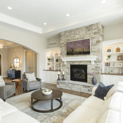 Great Room with Stone Fireplace and Built-ins