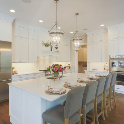 Kitchen with Custom Cabinetry, Large Island with Seating and Luxury Appliances