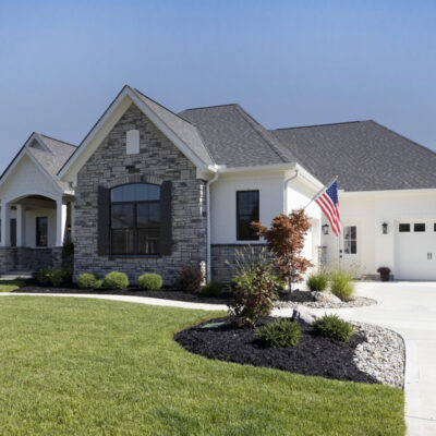 Front View of Custom Home with 3 Car Garage