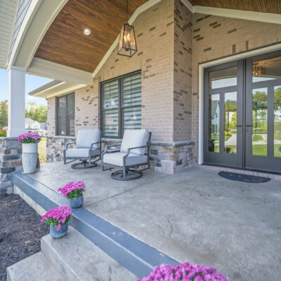 Modern Farmhouse Custom Home with Hardie Shake Siding, Brick, Stone and Large Covered Front Porch