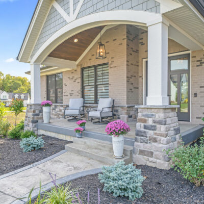 Modern Farmhouse Custom Home with Hardie Shake Siding, Brick, Stone and Large Covered Front Porch