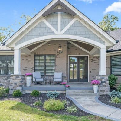 Modern Farmhouse Custom Home with Hardie Shake Siding, Brick, Stone and Large Covered Front Porch