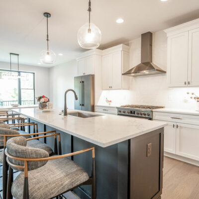 Modern Kitchen with Large Island and Dining Area with Walk-out to Screened Porch