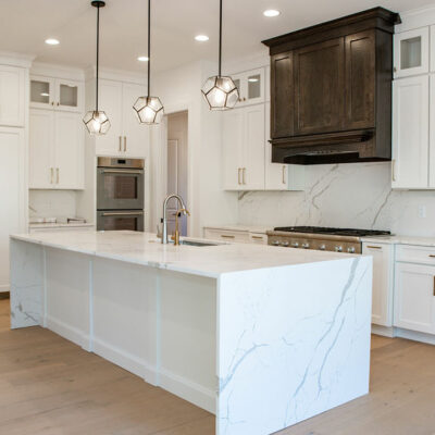 Kitchen with Luxury Appliances and Island with Waterfall Edge