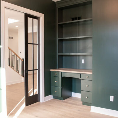 Study with glass pocket door and built-ins