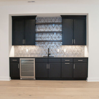 Lower Level Bar with Wine Fridge and Stairwell