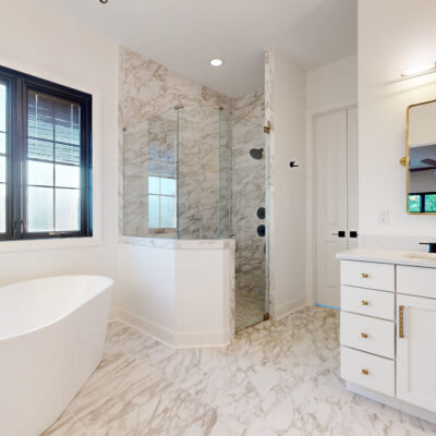 Primary Bathroom with Zero Clearance Shower and Free-Standing Tub