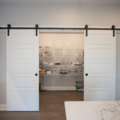 Modern Kitchen and Pantry with Sliding Barn Doors
