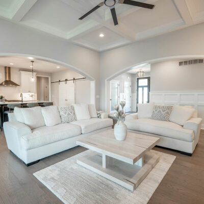 Modern Great Room with Coffered Ceiling, Arched Cased Openings to Kitchen