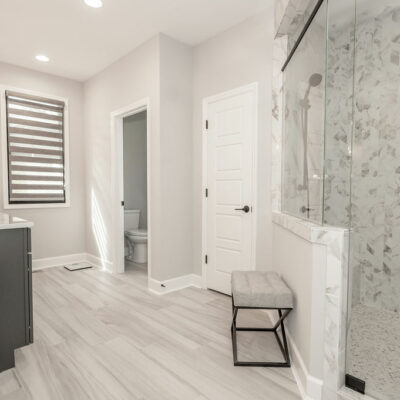 Primary Bathroom with Large Walk-In Shower with Black Fixtures