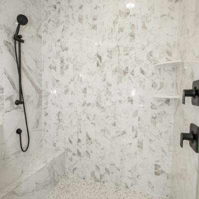 Primary Bathroom Large Walk-In Shower with Black Plumbing Fixtures