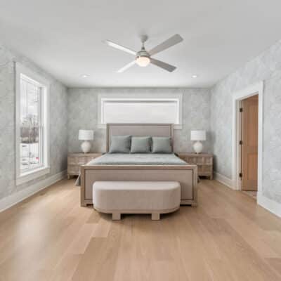 Secondary Bedroom with with soft powdery wallpaper
