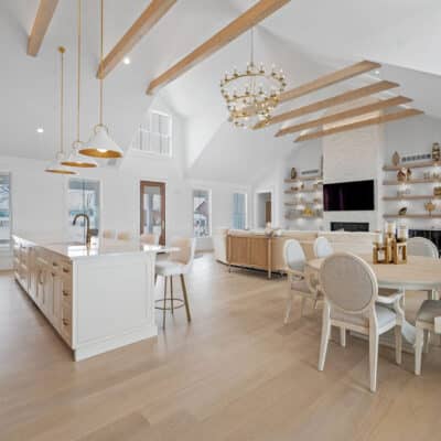 Open Floor Floor Plan with Great Room and Kitchen with White Oak Suspended Truss Beams
