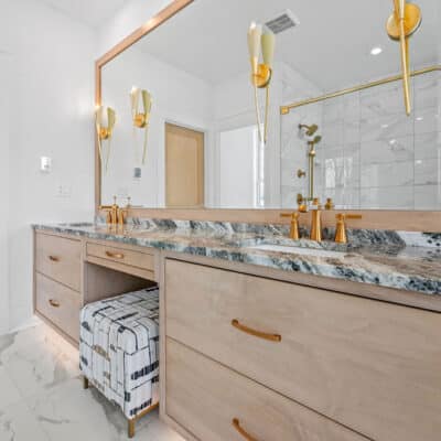 Primary Bath with Floating Double Sink Vanity, Framed Mirror with Integrated Sconces