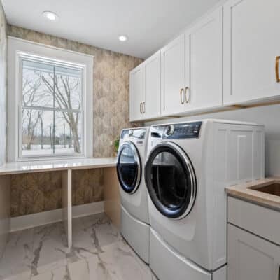 Laundry Room With Window in Luxury Farmhouse