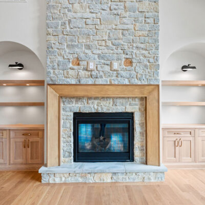 Great Room Stone Fireplace Arched Custom Built-ins