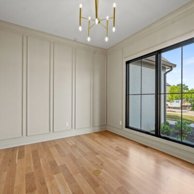 Home Office With Wall Molding and Glass Doors
