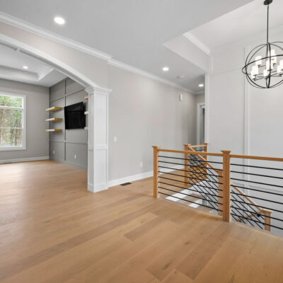 Accent Wall in Entry With Modern Staircase with Wood and Metal Stair Handrail