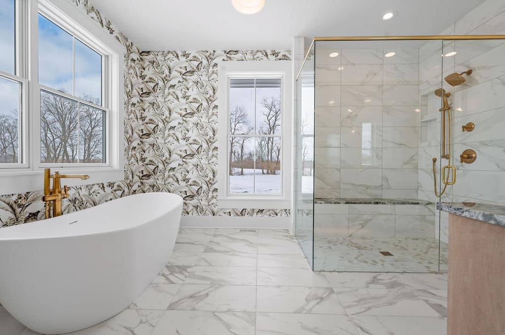 Zero threshold shower and free standing tub in primary bathroom