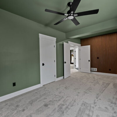 Lower Level Office With Acoustical Wood Panels and Custom Built-in Desk