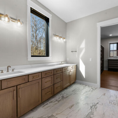 Double Vanity Wood Stained Cabinetry with Window