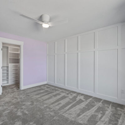 Second Floor Bedroom With Wainscotting Accent Wall