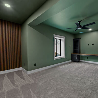Lower Level Office With Acoustical Wood Panels and Butcher Block Built-in Desk