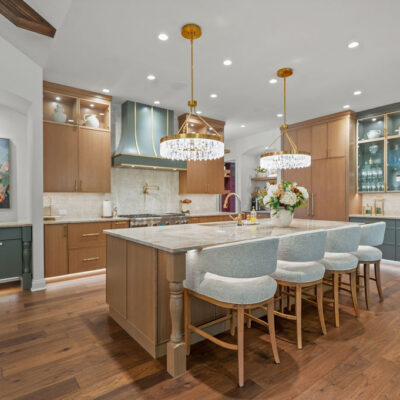Custom Kitchen with rift-cut white oak cabinets and painted SW Homburg Gray Wieland Builders