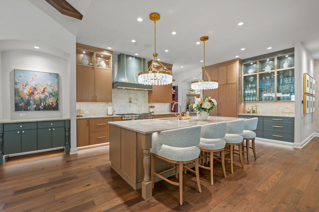 Custom Kitchen with rift-cut white oak cabinets and painted SW Homburg Gray Wieland Builders