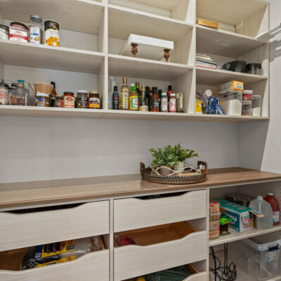 Kitchen pantry with open shelving and drawers