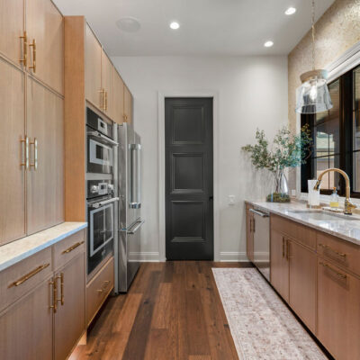 Back Kitchen with Appliances, pantry and Rift Cut White Oak Cabinetry