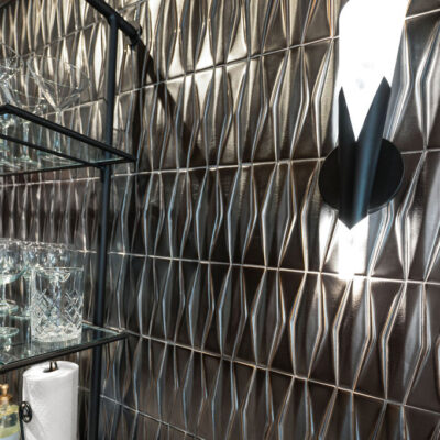 First Floor Bar Geometric Gun Metal Backsplash With Sconce