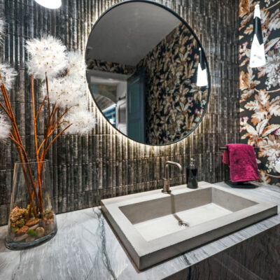 Powder Room With Floating Vanity and Cement Trough Sink