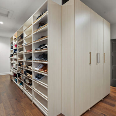 Walk-In Closet Between Primary Bedroom and Mudroom