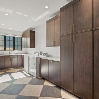 Mudroom Laundry With Oversized Checkerboard Tile Floor