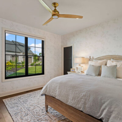 First Floor Guest Bedroom with soft wallpaper