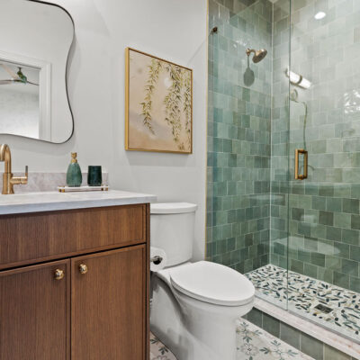 Guest Suite Bathroom With Printed Floor Tile and Neutral Colors White Oak Rift-Cut Cabinetry