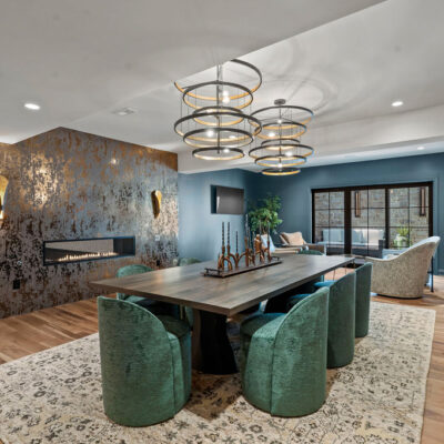 Bourbon Tasting Room With Double Sided Fireplace With Iron Look Finish With Copper